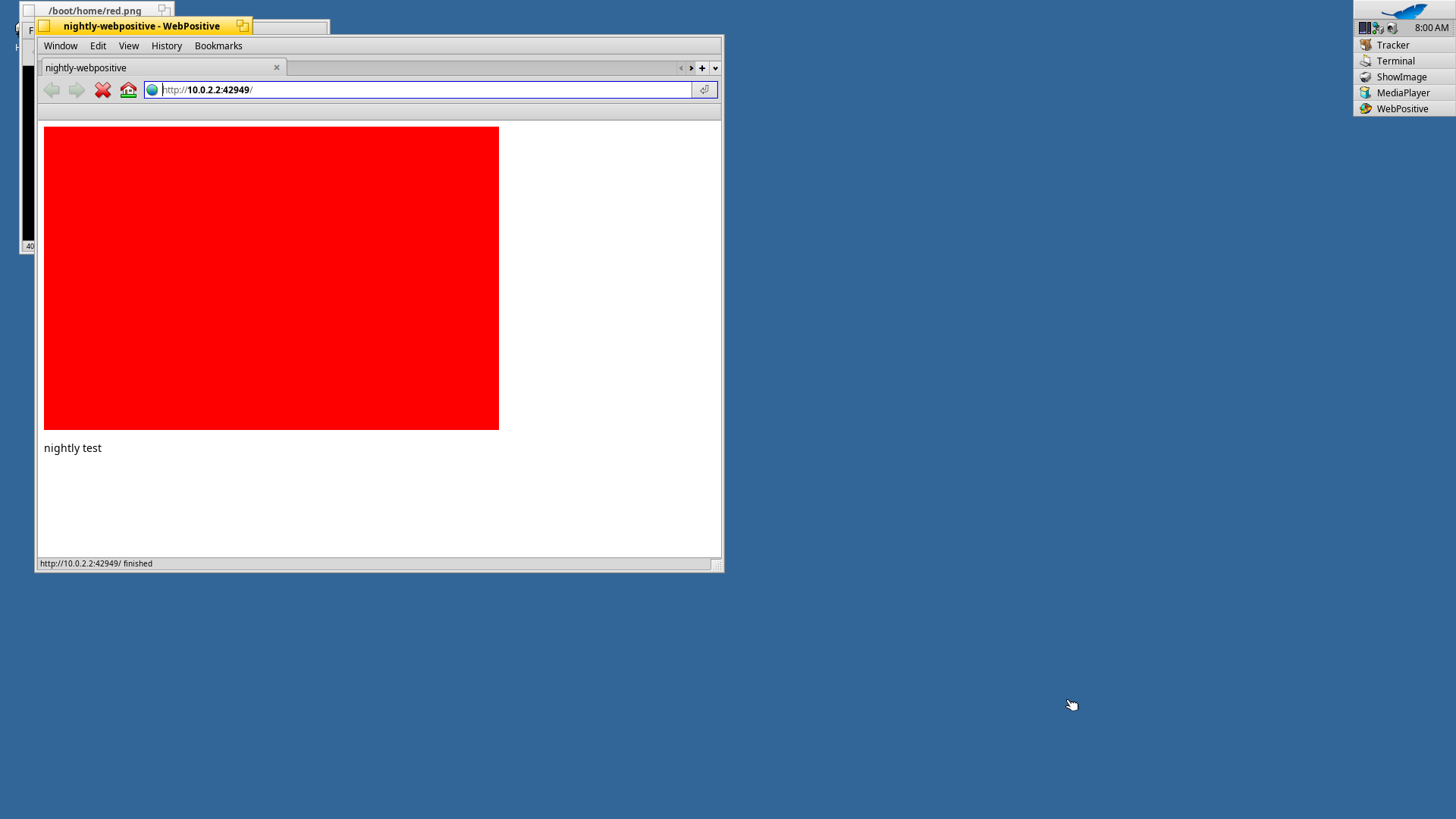 The Haiku desktop running on RISC-V, with the WebPositive browser window open on a page it fetched over HTTP and rendered.